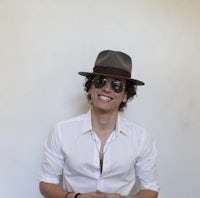 a man wearing sunglasses and a hat